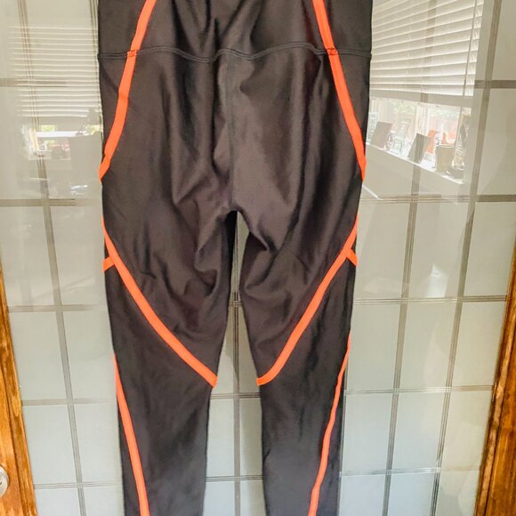 UnderArmour Compression HeatGear Leggings, W Med, Black With Orange Piping - Picture 2 of 2